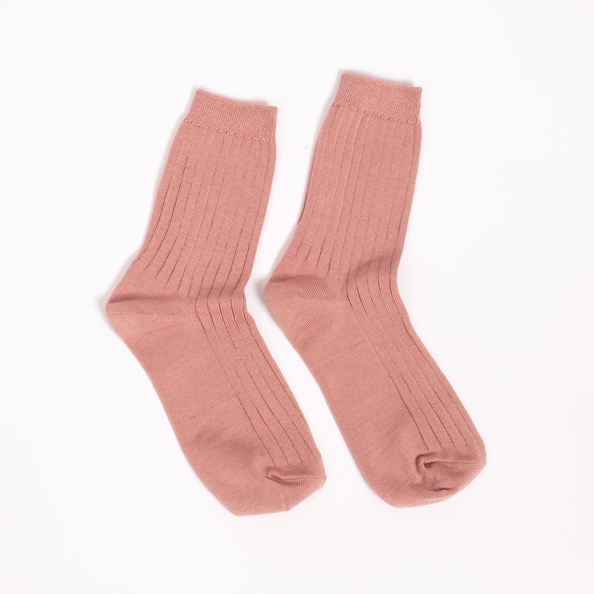 Her Socks in Desert Rose